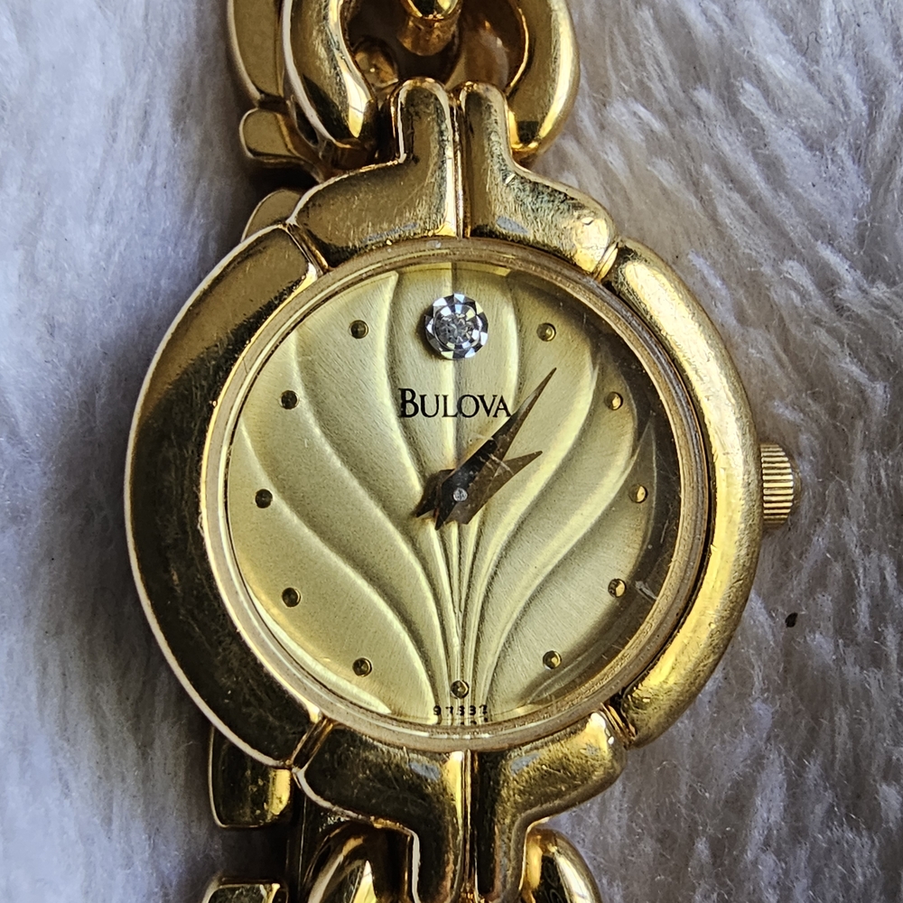 Bulova Quartz Gold Women's Watch With Diamond Chip